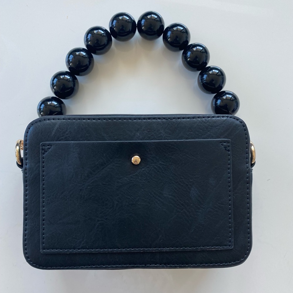 Ah.dorned ‘Camera’ bag / small handbag